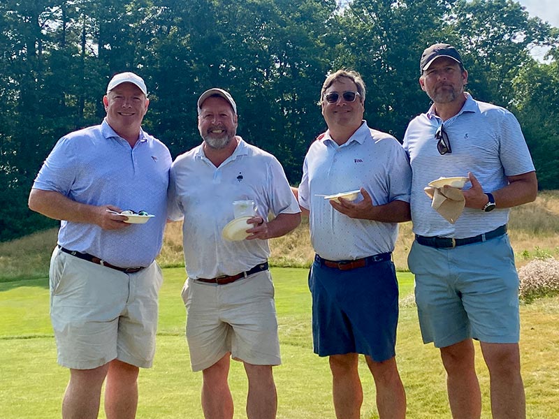 Guys Golfing and Eating Ice Cream at an Event