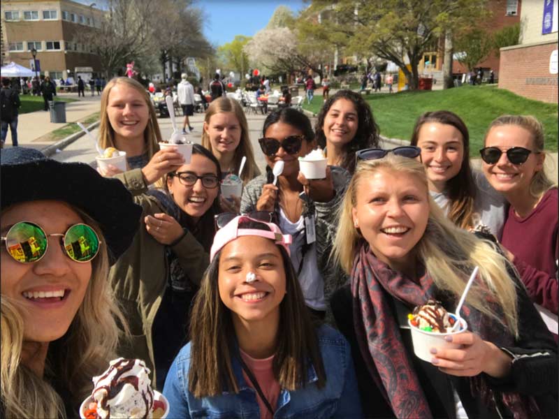 College Kids Celebrating Graduation with Ice Cream Emergency