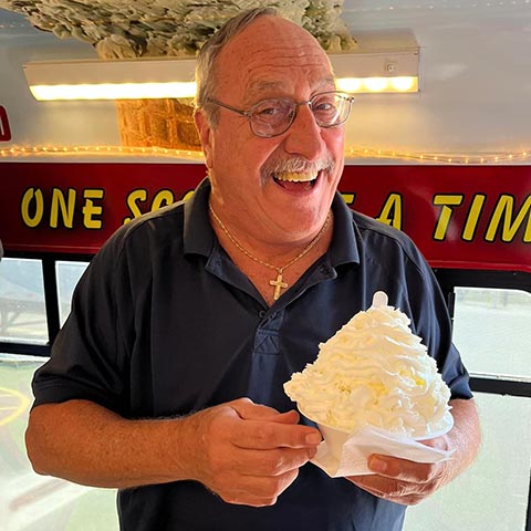 Man Enjoying Large Ice Cream Sundae Man Enjoying Large Ice Cream Sundae