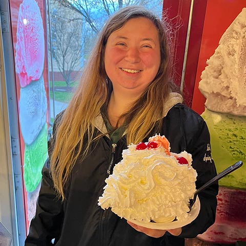 Woman Holding Big Ice Cream Sundae from Mobile Ice Cream Parlor Woman Holding Big Ice Cream Sundae from Mobile Ice Cream Parlor