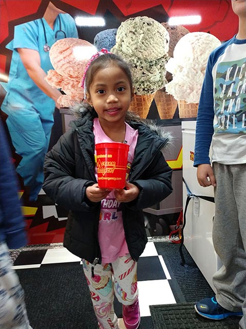Little Girl Holding Ice Cream at an Event in Southern Rhode Island Little Girl Holding Ice Cream at an Event in Southern Rhode Island