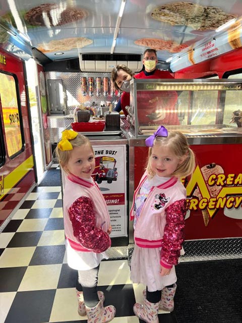 southern-rhode-island-twins-ordering-ice-cream Two Girls Getting Ready to be Service on the Ice Cream Bus in Southern RI