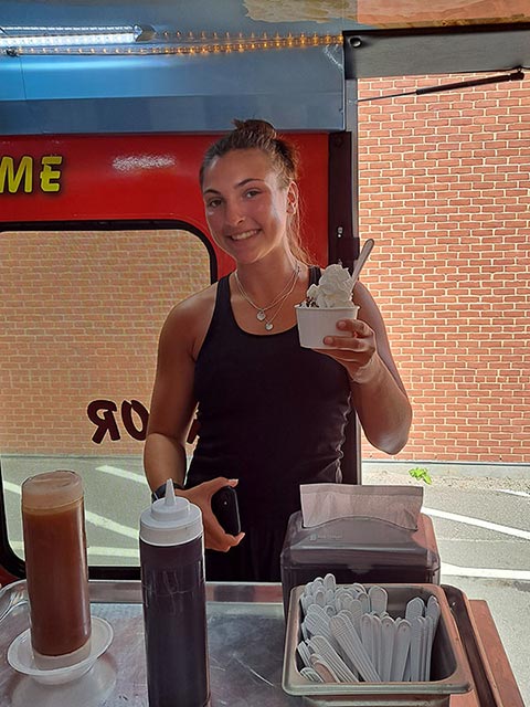 Teen Holding Her Ice Cream at an Event in Southern RI Teen Holding Her Ice Cream at an Event in Southern RI