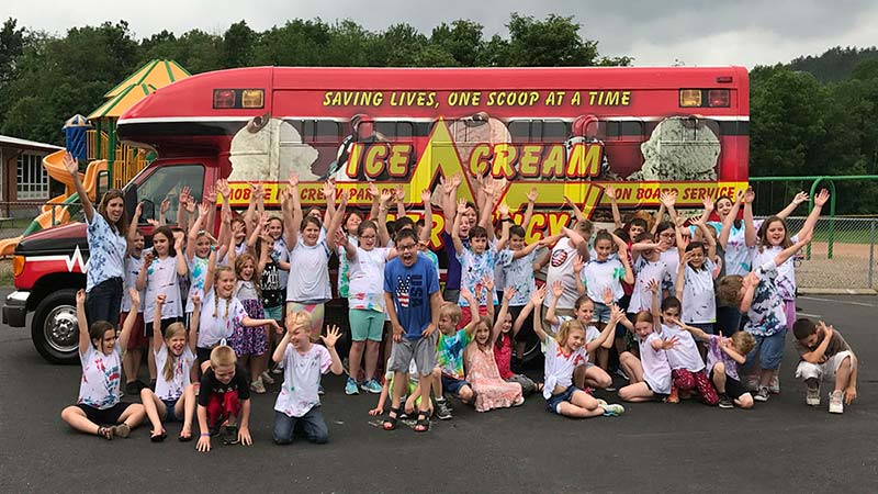 Lot's of Kids Celebrating Ice Cream with Their Friends