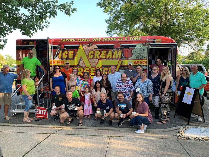 School Function with Guests Enjoying Ice Cream School Function with Guests Enjoying Ice Cream