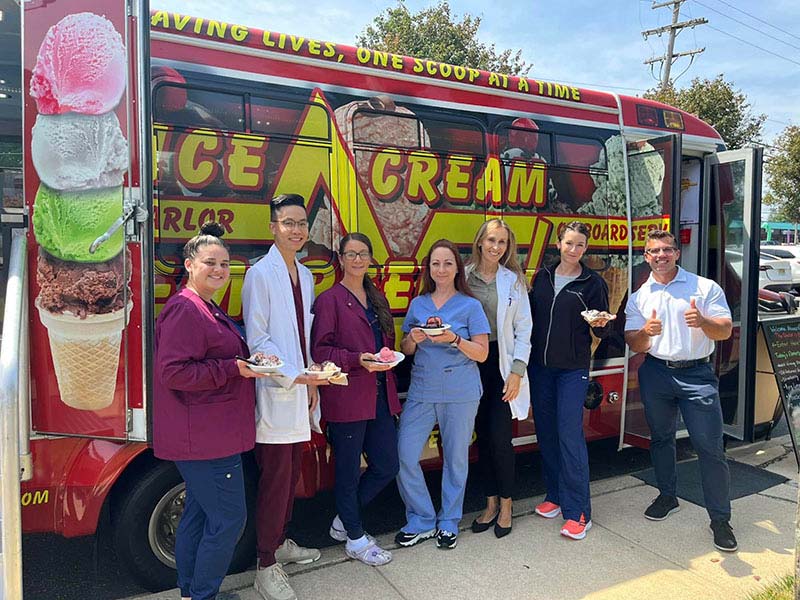 Jersey Shore Group of People Eating Ice Cream at an Event Jersey Shore Group of People Eating Ice Cream at an Event