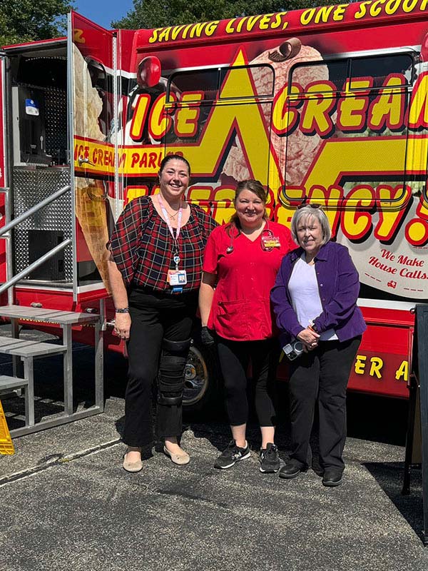 Standing in Front of Ice Cream Emergency Bus Southern NH & Boston North MA