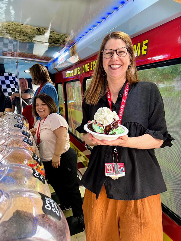 teacher-holding-ice-cream-sundae-in-nj Central New Jersey Ice Cream Event