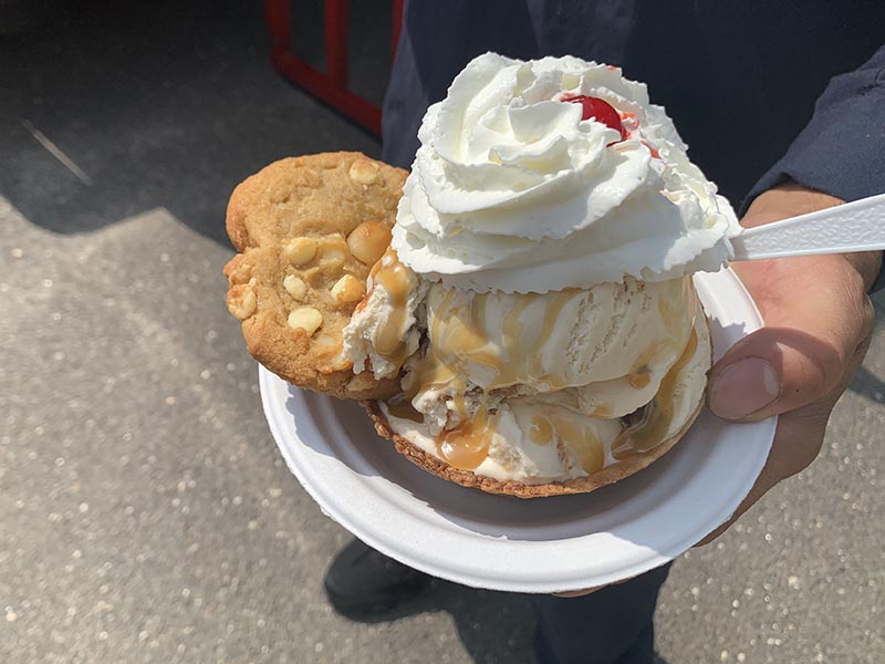 Employee Holding Ice Cream Sundae
